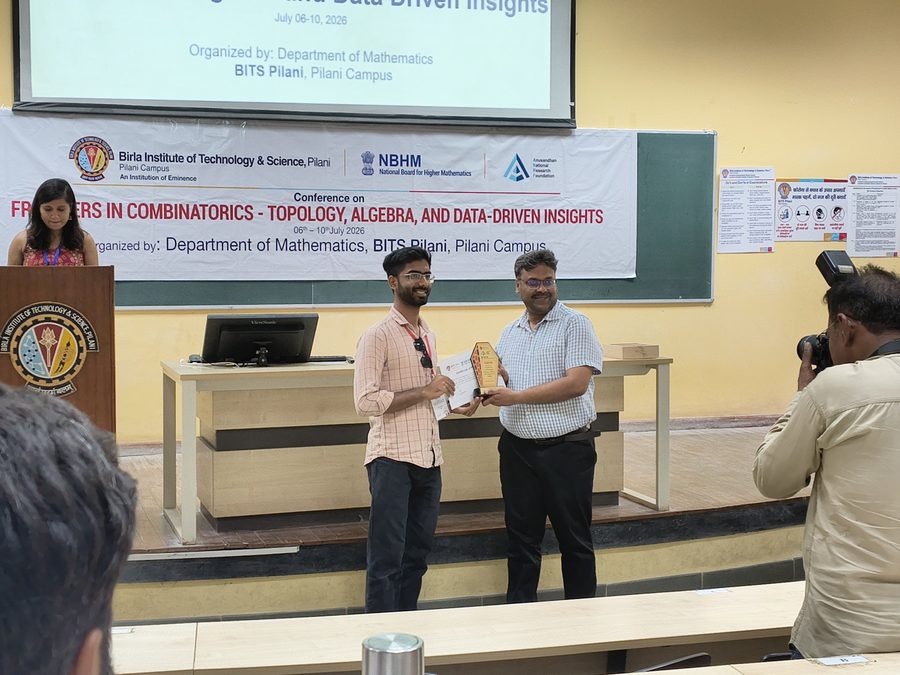 FroCo 2026, Yash receiving a memento for delivering the contributed talk
